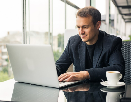 a man using avp suite antivirus in his laptop